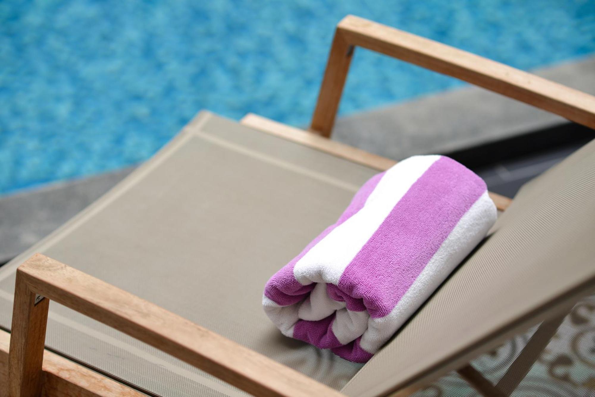 普拉纳科恩别墅酒店–罗莱夏朵 曼谷 外观 照片 A pool towel
